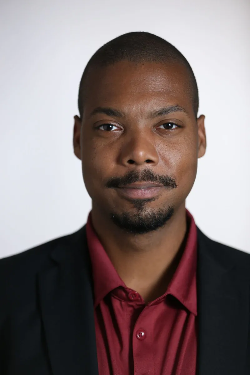 Portrait unavailable — blurred placeholder